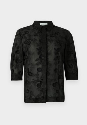 Camisa preta com bordados florais, mangas longas e colarinho. Tecido transparente com um acabamento texturizado e detalhes intrincados.