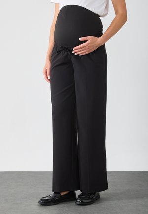 Auduma bikses - black