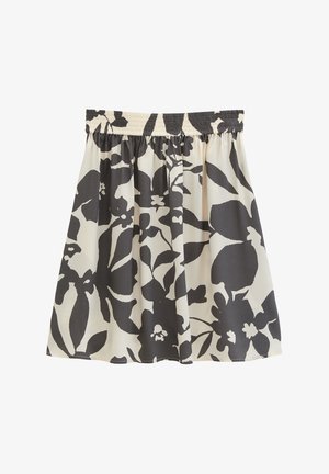 Jupe crème avec grand imprimé floral noir et taille élastique, tissu froncé créant des plis doux.