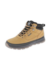 Tan ankle boots made of leather with a cushioned gray sole, featuring black accents, metal eyelets, and a logo on the tongue.