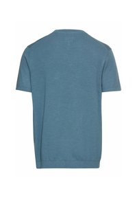 Kortærmet T-shirt med rund hals i et blødt, tekstureret, afdæmpet blåt stof. Har et rent, enkelt design uden synlige mønstre eller detaljer.