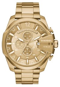 Gold-toned Diesel watch with a textured dial, chronograph subdials, and a metal bracelet. Features a date display and luminescent markers.