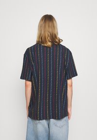 Karl Kani T-shirt med print - dark blue