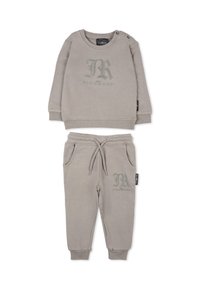 Felpa grigia in cotone con joggers coordinati. La felpa presenta una stampa del logo e dettagli con bottoni; i pantaloni hanno una coulisse e tasche laterali.