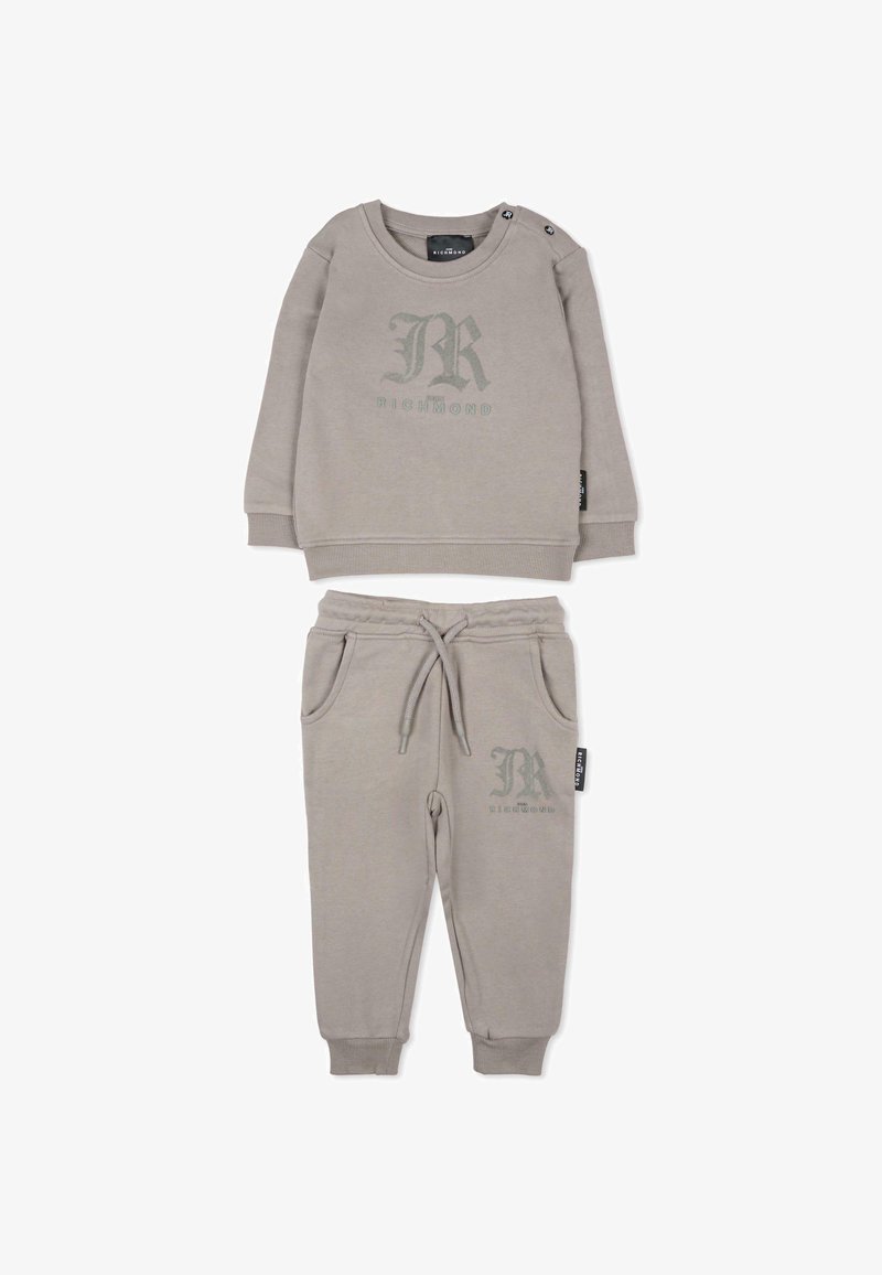 Felpa grigia in cotone con joggers coordinati. La felpa presenta una stampa del logo e dettagli con bottoni; i pantaloni hanno una coulisse e tasche laterali.