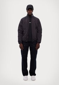 EA7 Emporio Armani GIUBBOTTO UNISEX - Giacca da mezza stagione - black
