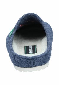 Blue felt slip-on shoe with a soft white interior lining and textured outer surface. Features a flat white sole and a small green tag.