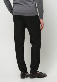 PROFUOMO Pantalones chinos - black