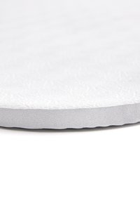 Runde, strukturierte weiße Oberfläche mit einem leicht dicken Rand. Das Material wirkt glatt mit einem dezenten, erhabenen Muster, geeignet für verschiedene Anwendungen.