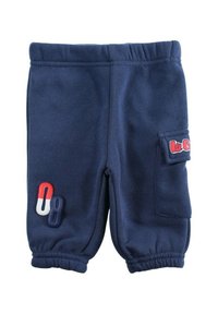 Pantalon de survêtement en coton bleu marine avec taille élastique, chevilles resserrées et poche latérale ornée d'un patch logo rouge et blanc.