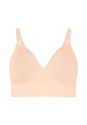 Perzik naadloze bralette met een V-hals ontwerp en verstelbare bandjes. Zachte stof en een brede band aan de onderkant voor extra comfort.