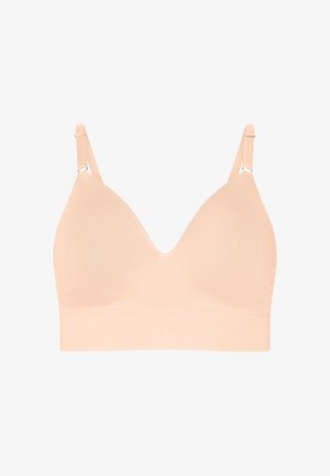 Peach seamless bralette with a v-neck design and adjustable straps. Soft fabric and a wide band at the bottom for added comfort.