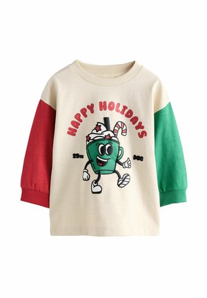 Crème fleece sweatshirt met rode en groene mouwen. Voorzien van een cartoon-drankpersonage en de tekst "HAPPY HOLIDAYS" in vette, speelse lettertype.
