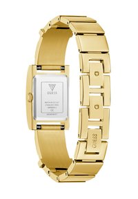 Reloj de acero inoxidable dorado con caja rectangular y pulsera de eslabones. Cuenta con una esfera blanca con el logo de la marca y marcaciones de resistencia al agua.