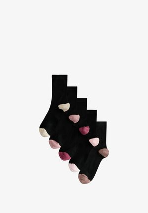 Five pairs of black socks with different colored toes and heels in beige, light pink, dark pink, blush, and brown arranged diagonally.