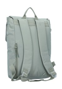 Light gray backpack made of soft fabric, featuring padded straps, a top handle, and a side zip pocket for added functionality.