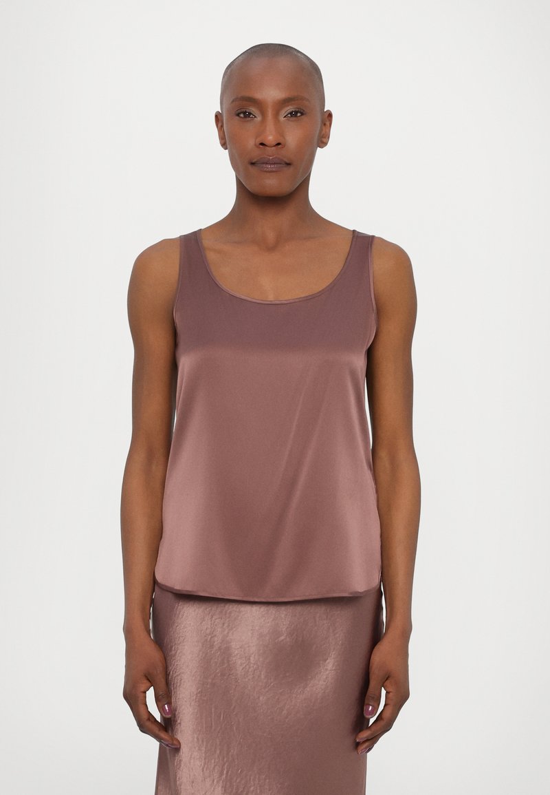 Dark mauve satin tank top with a round neckline and narrow straps, paired with a matching shiny midi skirt. Smooth texture, minimal design.