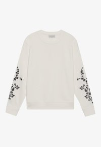 Sudadera blanca de manga larga con bordado floral negro en ambas mangas. Cuello redondo y puños de canalé en las muñecas y en el dobladillo.