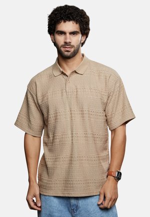 - Koszulka polo