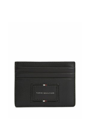 Schwarzer Tommy Hilfiger Kartenhalter mit drei Kartenfächern und einem Logo-Patch mit roten, weißen und marineblauen Streifen.