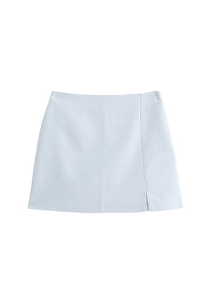 Mini falda azul clara hecha de tejido texturizado con corte recto. Presenta una abertura lateral para un detalle adicional.