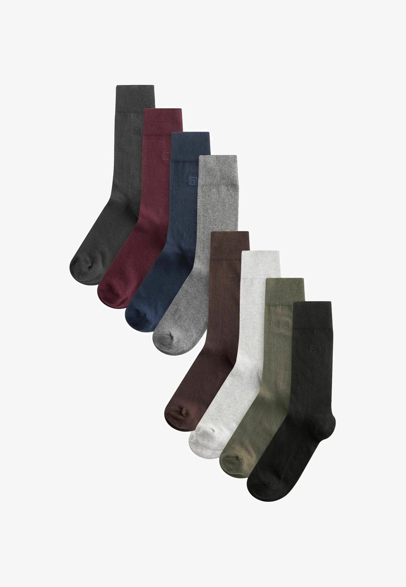 Aštuonių kojinių rinkinys įvairių spalvų: tamsiai pilka, burgundinė, tamsiai mėlyna, šviesiai pilka, tamsiai ruda, šviesiai žalia ir juoda. Medvilnės medžiaga, su įbanguotais kraštais.