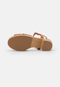 Unisa IRAM - Clogs - toffee
