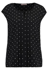 Blouse noire à manches courtes avec pois blancs, détail plissé sur le devant et col rond de la marque Anna Field.