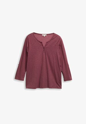 Camicia a maniche lunghe a quadri bordeaux con scollatura a V, tre bottoni sul davanti e maniche arrotolate, realizzata in un tessuto morbido.
