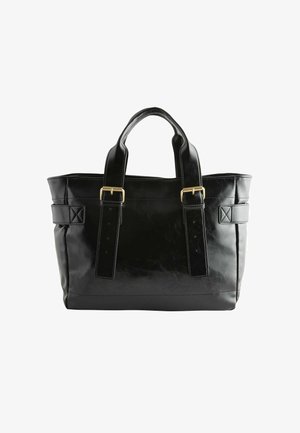 Black leather tote bag with dual handles, featuring gold-tone hardware and structured shape; includes adjustable straps and flat bottom.