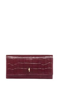 Burgundowa skórzana portmonetka z tłoczeniem imitującym krokodylą skórę. Posiada złoty akcent w postaci logo. Prostokątny kształt z zakładanym klapkiem.