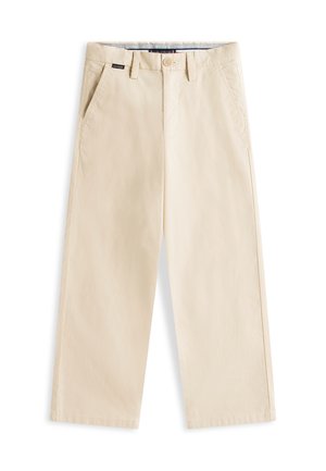 Beige bomullsbukser med rette bein, sidelommer, beltehemper, knappelukking og liten logotagg på midjebåndet.