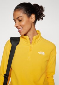 The North Face GLACIER CROPPED ¼ ZIP - Flīsa džemperis - summit gold