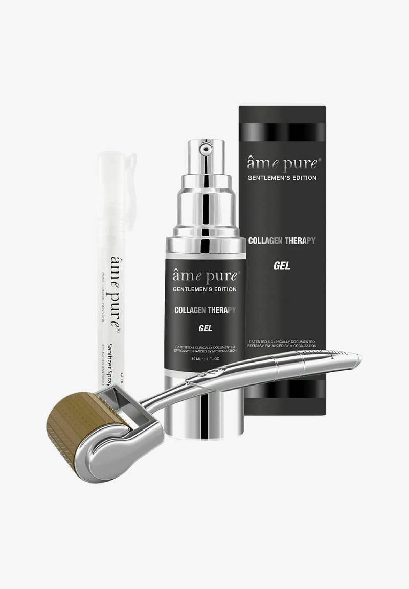 Kollagenbehandlingssæt med en sølvroller, klar desinfektionsspray og sort gel-flaske med hvid tekst og skinnende metalliske accenter.