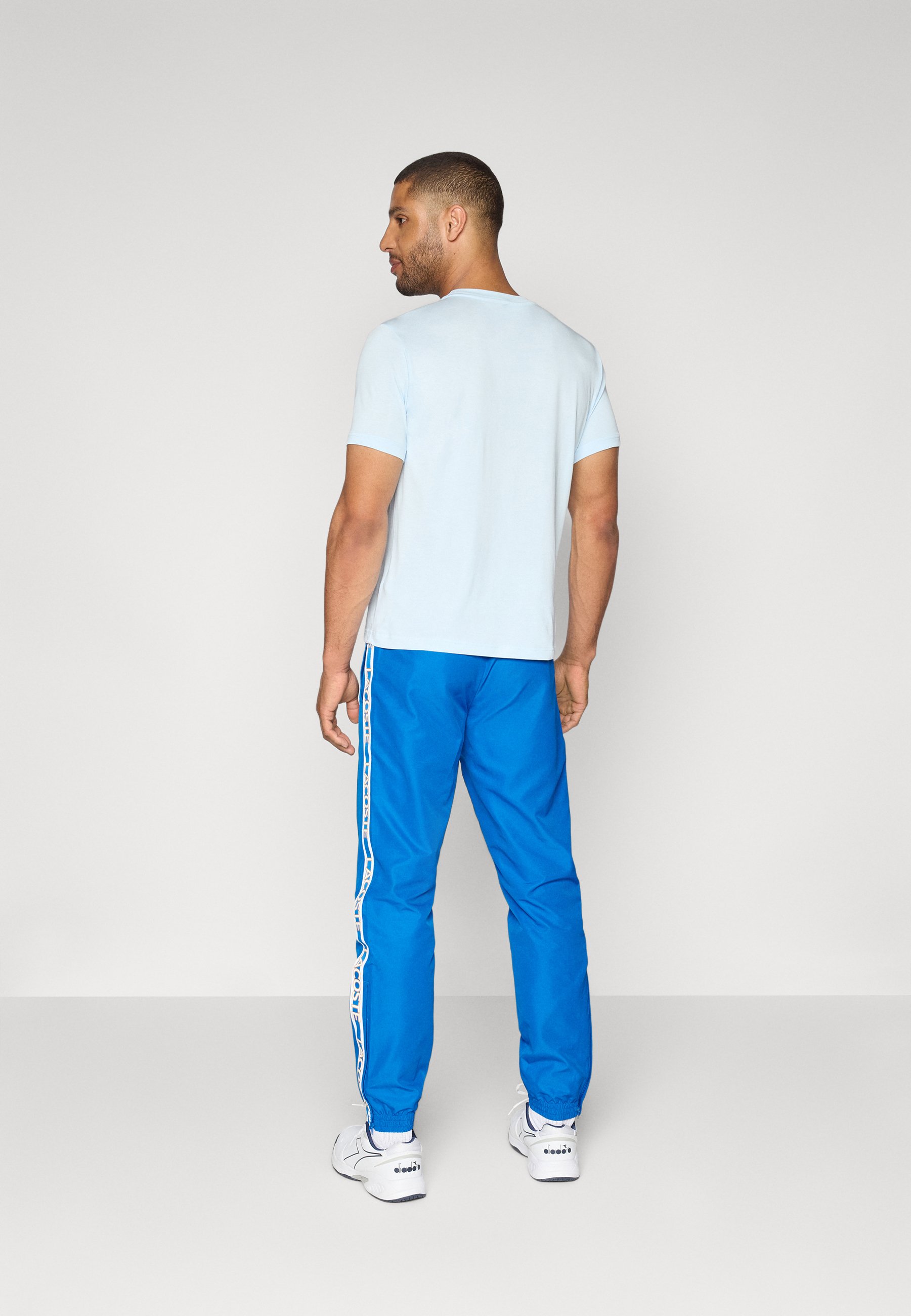 Lacoste Sport TENNIS PANT - Tracksuit bottoms - gipsy blue/blue