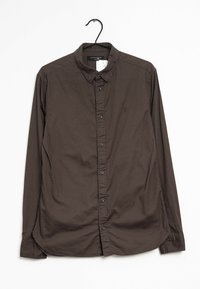Camicia marrone a maniche lunghe con chiusura frontale a bottoni, colletto classico e un piccolo logo ricamato sul petto. Tessuto in cotone liscio.