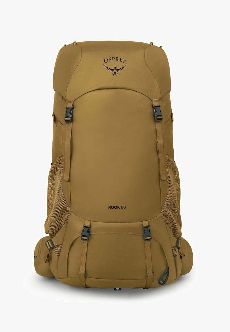 La mochila Osprey Rook 50 en tejido marrón presenta un gran compartimento principal, bolsillos laterales de malla y correas ajustables para un transporte seguro.