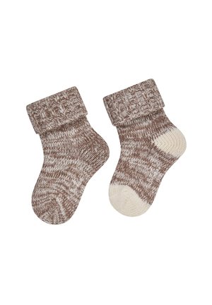 Pair of brown and beige knitted baby socks with folded ribbed cuffs, isolated on white background.