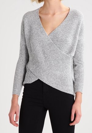 Stickad tröja - grey