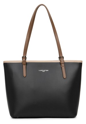 Black tote bag made of smooth material with brown leather straps, featuring a beige trim and silver logo detailing on the front.