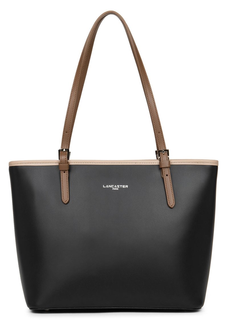 Sac fourre-tout noir en matériau lisse avec des anses en cuir marron, comportant une garniture beige et des détails de logo en argent à l'avant.