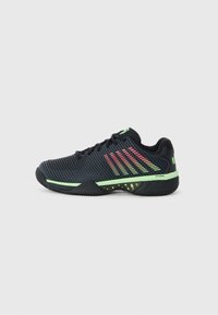 Black athletic shoes with a textured upper, featuring green and pink gradient stripes and a durable rubber sole for traction.