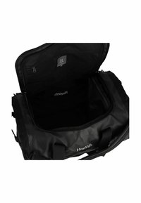 Borsa a duffel nera realizzata in materiale resistente, con un ampio interno, tasca con cerniera e dettaglio con logo. Manici per un facile trasporto.