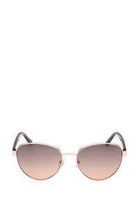 Bruine gradient zonnebril met een dunne metalen roségouden frame, zwarte pootjes en transparante neuspads; cat-eye vorm met glanzende afwerking.