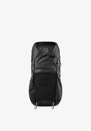 Sac à dos de randonnée noir avec poche avant et sangles latérales réglables, vu de face sur fond blanc.