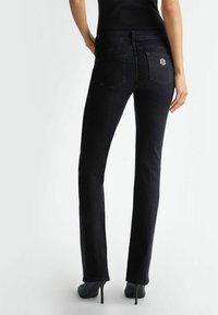 LIU JO WITH BUTTONS - Bootcut-teksad - black