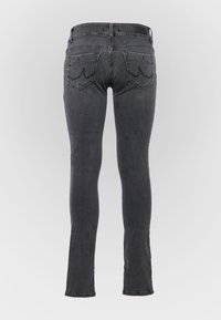 Skinny-fit jeans in dark gray denim, featuring a classic waistband, five-pocket styling, and distinctive back pocket stitching detail.