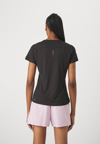 Puma RUN FAVORITES VELOCITY W - Sportovní tričko - puma black