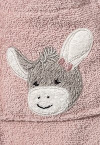 Pink towel featuring a gray donkey face embroidery with white ears, a pink bow, and textured fabric resembling soft terry cloth.