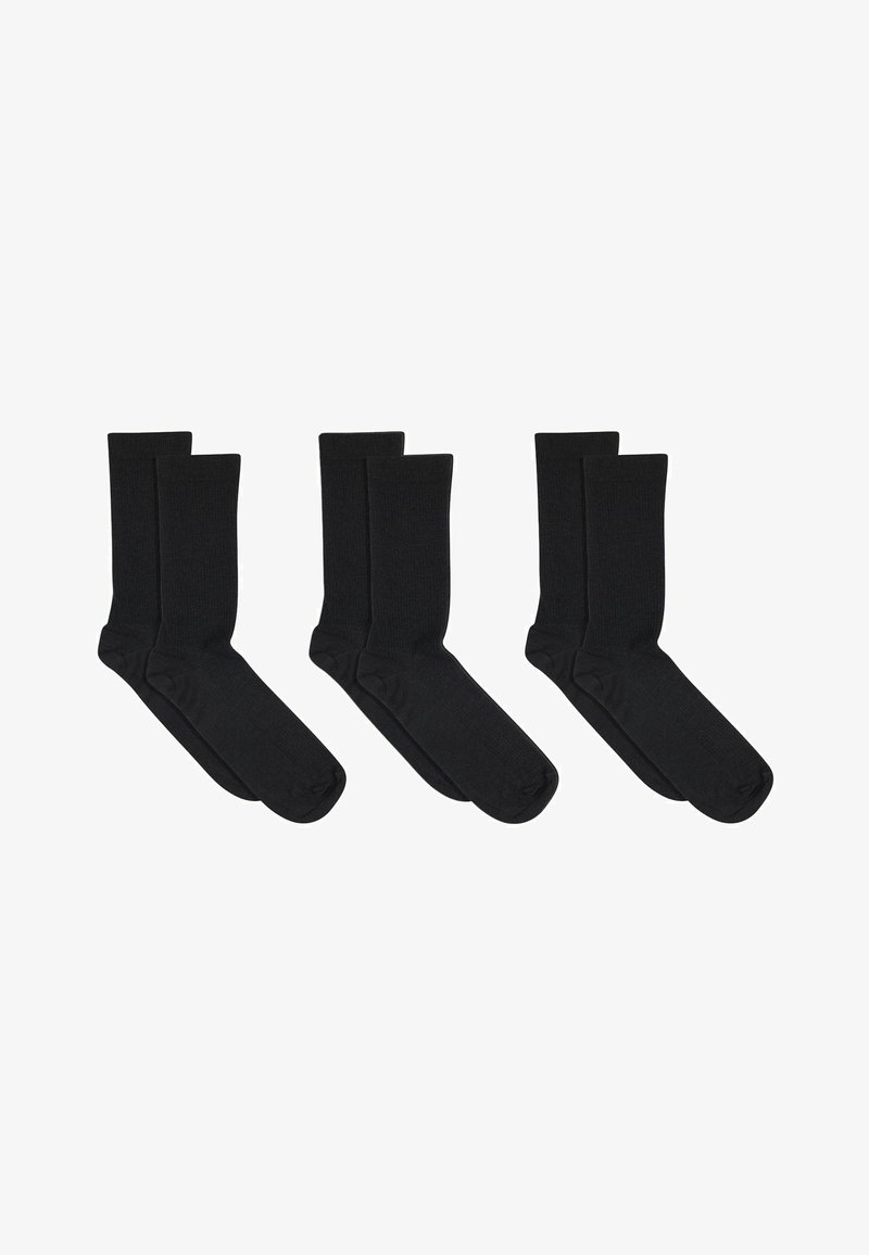 Trois paires de chaussettes noires mi-mollet disposées côte à côte sur un fond blanc.